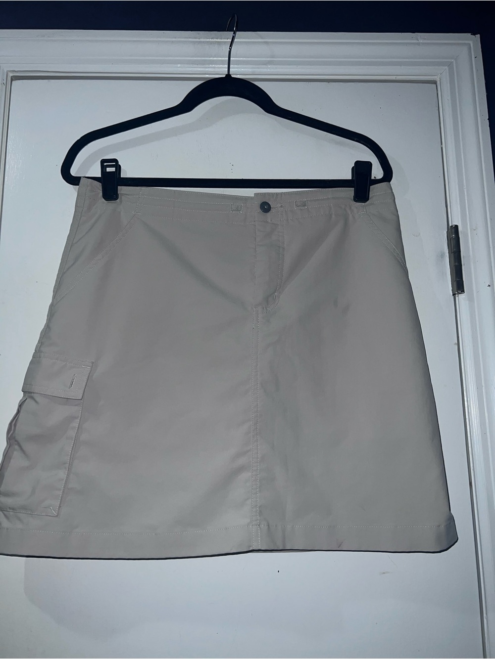 Patagonia light beige skort with multicolor logo